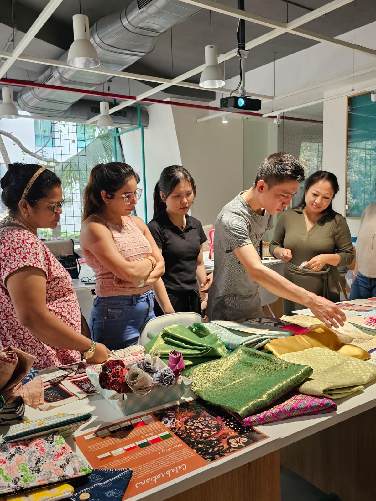 Students learning textile and fashion craft techniques